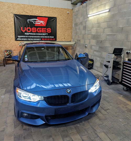 reprogrammation d'une bmw bleue par vosges reprog